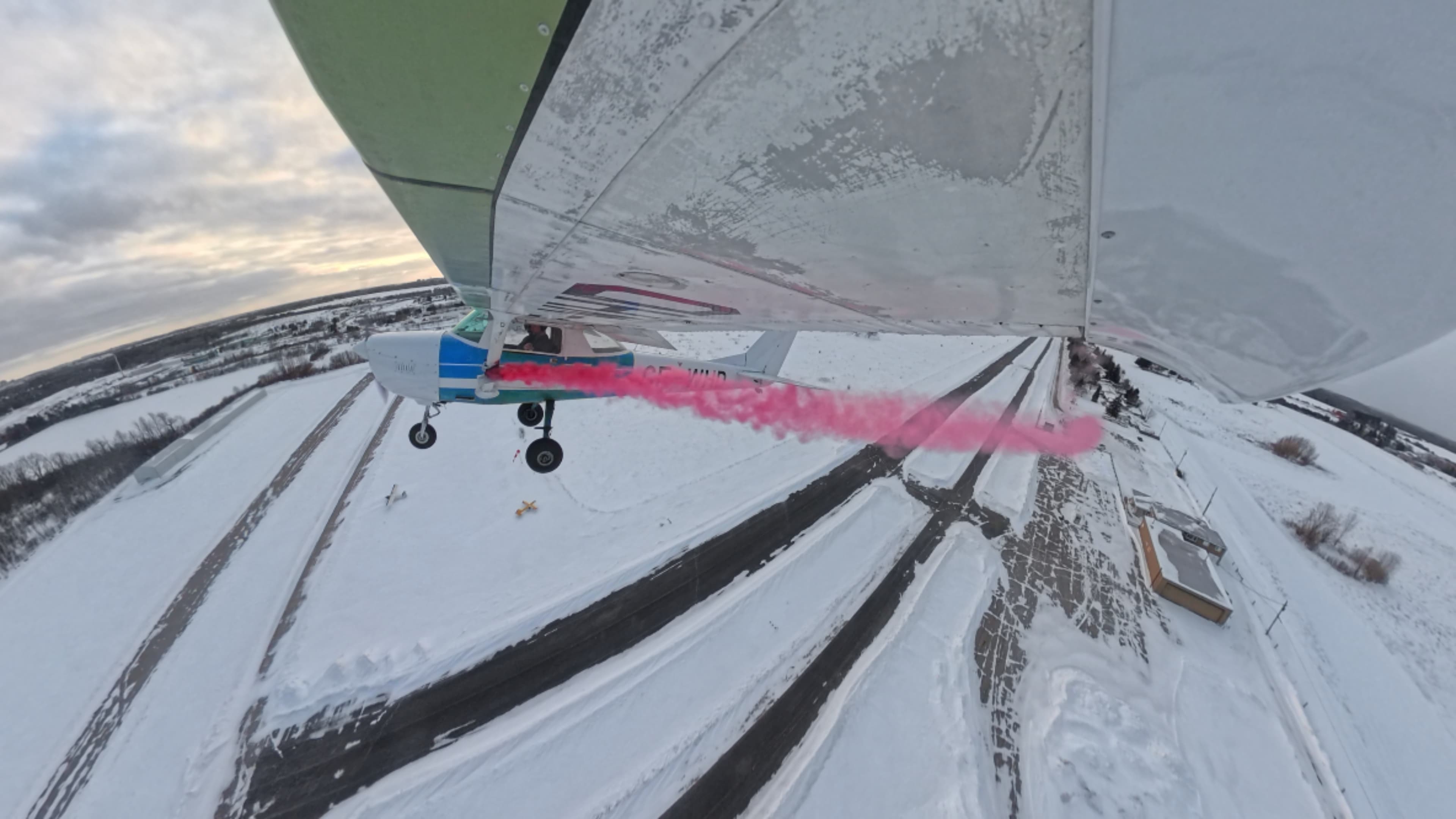 Pink smoke display aerial view