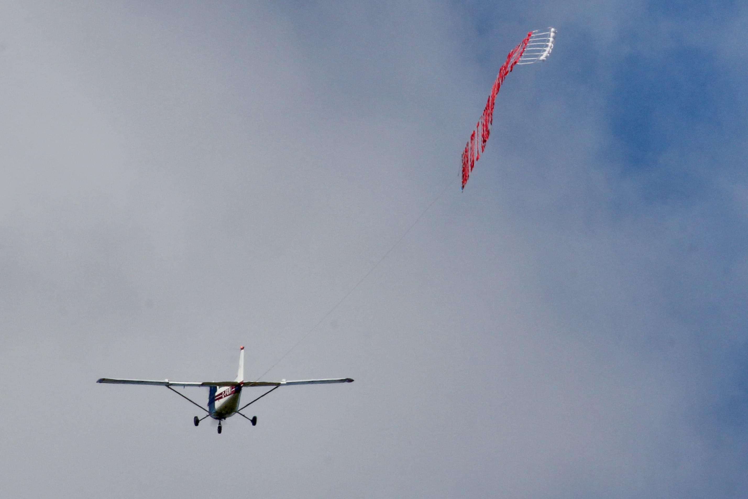 Sky Banners plane towing a letter banner