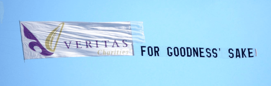 Veritas Charities combo banner in flight